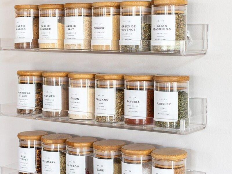 image-of-glass-containers-for-spices-and-herbs-storage-properly-arranged-and-labeled